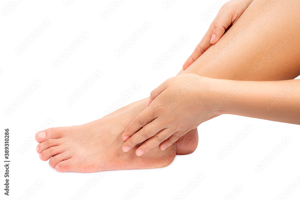Close up women feet on white background, Female taking care of her feet Close up women feet on white background, Female taking care of her feet