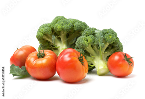 Fresh tomato and broccoli vegetable on white background