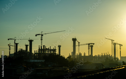 Construction Site in The Morning with a lot of cranes