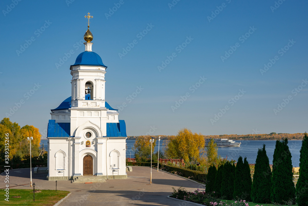 Fototapeta premium View of the Church of the Holy Theotokos of Kazan Monastery in the village of Vinnovka, on the banks of the river Volga, Samara region, Russia