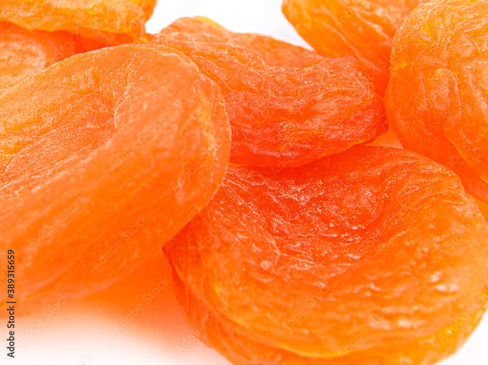 Dried apricots close-up on a white background. Dried apricots close-up on a white background.