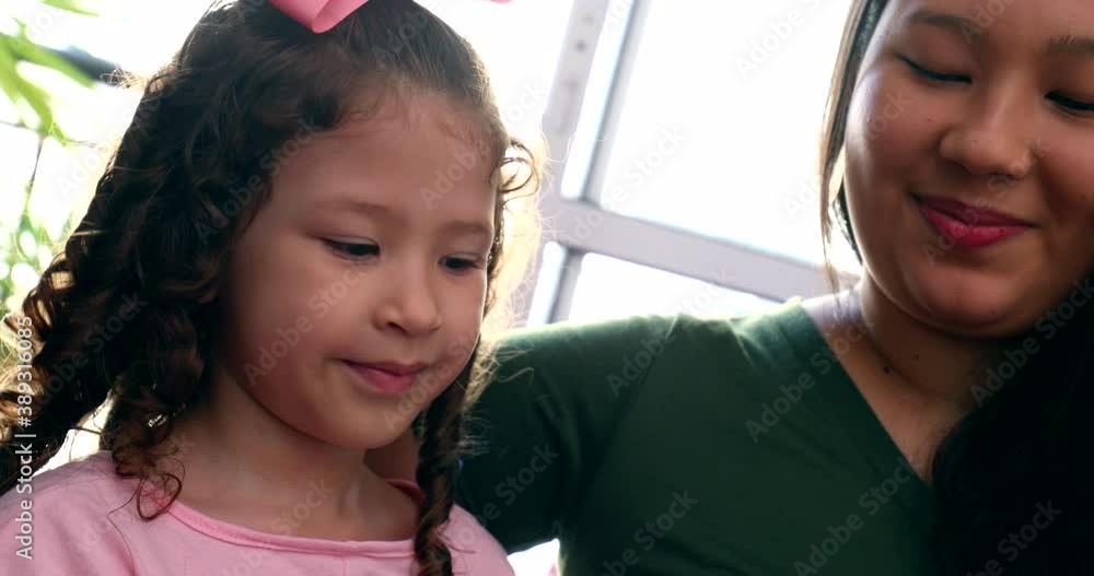 Diverse mother and daughter portaits, asian mom and mixed race kid Diverse mother and daughter portaits, asian mom and mixed race kid
