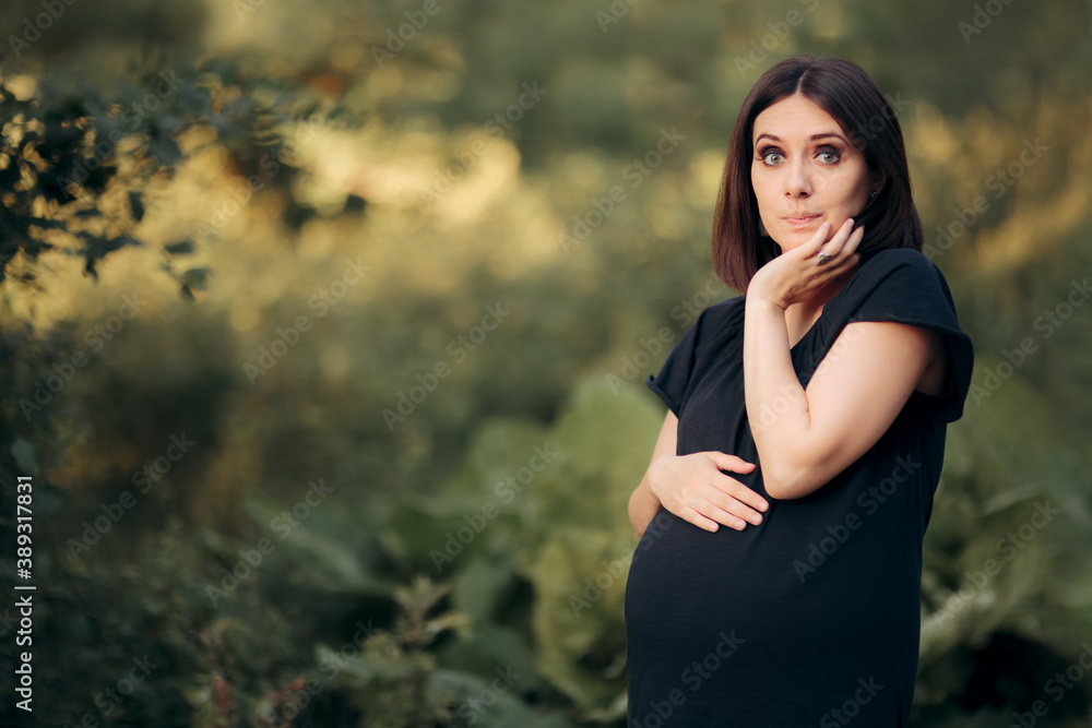 Worried Pregnant Woman Caressing Belly Worried Pregnant Woman Caressing Belly