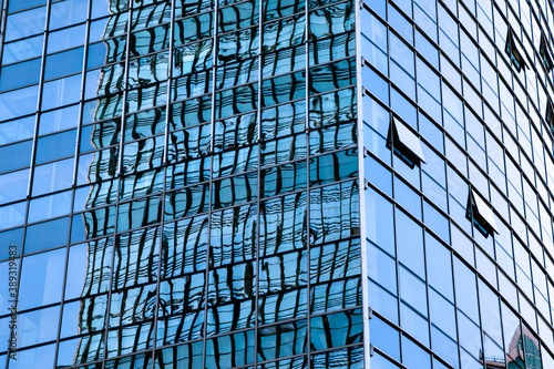 Closeup modern blue glass building