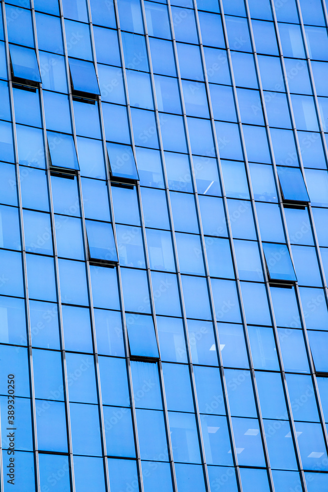 Closeup modern blue glass building Closeup modern blue glass building