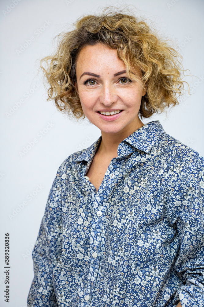 Woman's co-or.com portrait of a close-up head of a white background Woman's co-or.com portrait of a close-up head of a white background