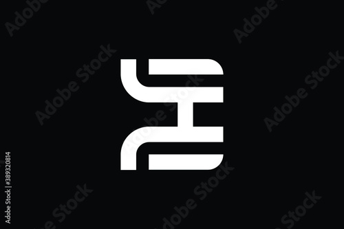 EH logo letter design on luxury background. HE logo monogram initials letter concept. EH icon logo design. HE elegant and Professional letter icon design on black background. E H EH HE