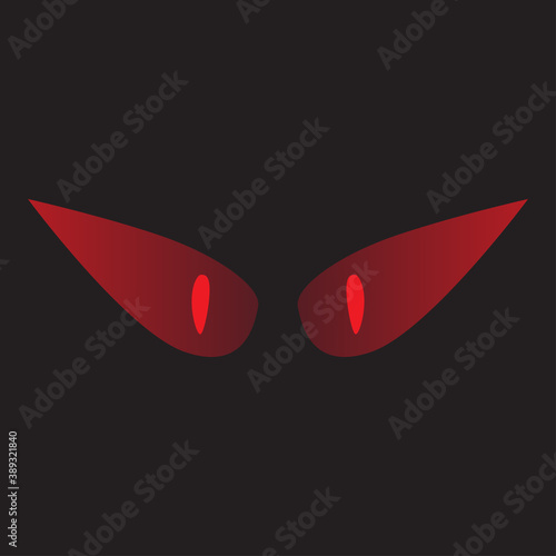 An abstract pair red eyes against a black background.