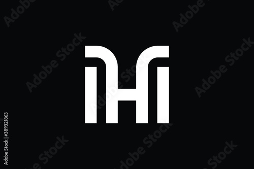 MH logo letter design on luxury background. HM logo monogram initials letter concept. MH icon logo design. HM elegant and Professional letter icon design on black background.  M H MH HM