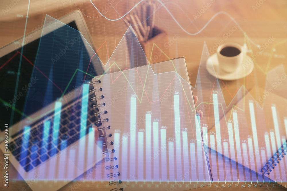 Double exposure of businesswoman hands typing on computer and forex chart hologram drawing. Financial analysis concept. Double exposure of businesswoman hands typing on computer and forex chart hologram drawing. Financial analysis concept.