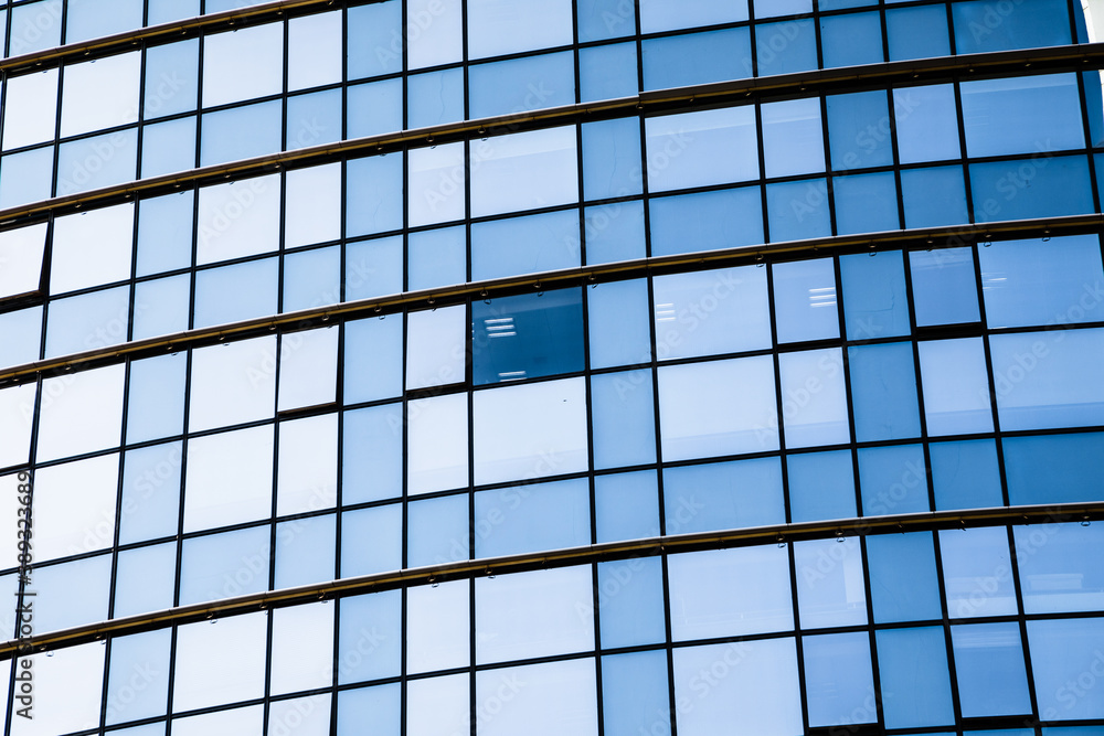 Closeup modern blue glass building Closeup modern blue glass building
