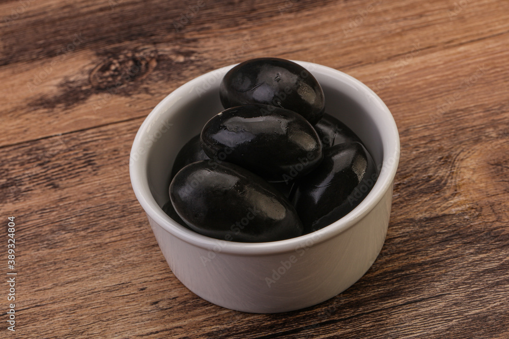 Pickled black olives in the bowl Pickled black olives in the bowl