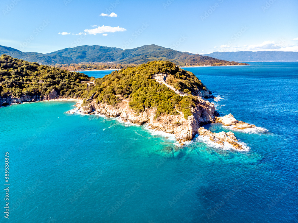 Drone aerial view of sea and rocks in Olympiada, Halkidiki, Greece