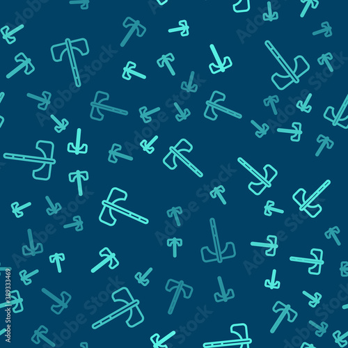 Green line Medieval axe icon isolated seamless pattern on blue background. Battle axe, executioner axe. Medieval weapon. Vector.