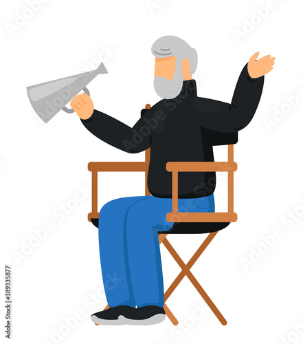 Movie film director with megaphone at workplace on white