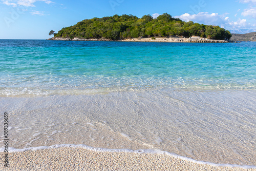 Fototapeta Naklejka Na Ścianę i Meble -  Crystal clear water and sand on beach of Ksamil in Albania