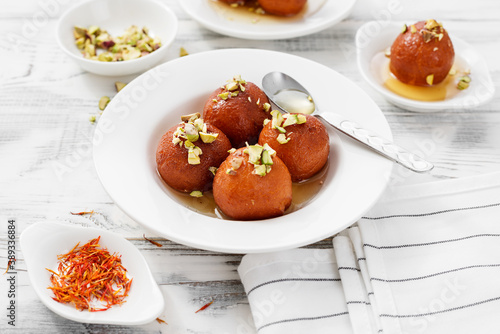 Gulab jamun traditional indian dessert.	 photo