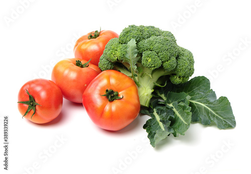 Fresh tomato and broccoli vegetable on white background