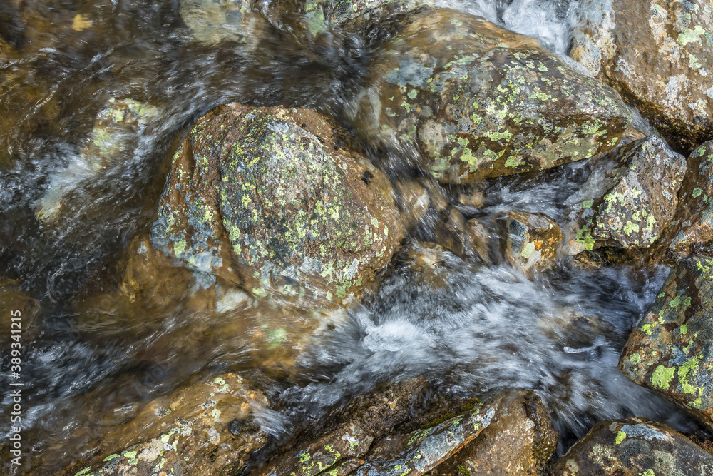 Running water in a small creek Running water in a small creek