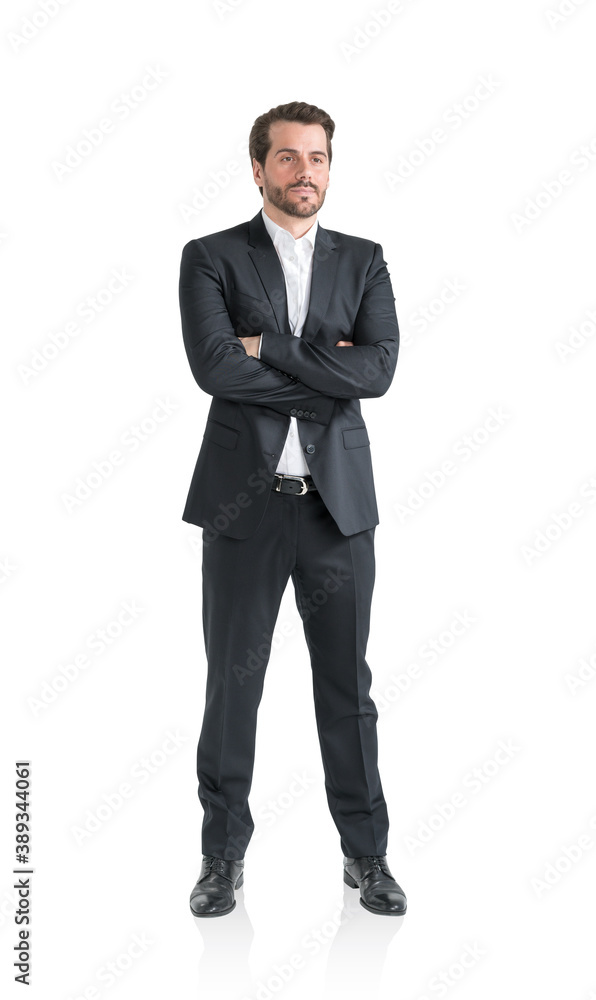 Confident young businessman with crossed arms, isolated