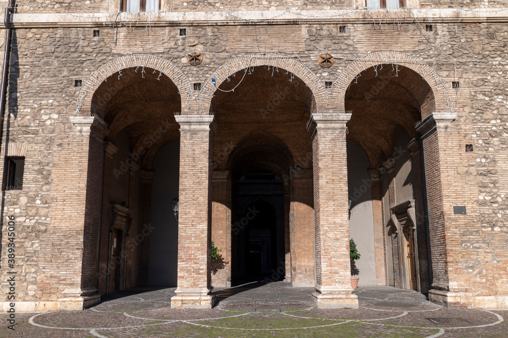 entrance with arches of the Spada palace, municipality of terni in umbria