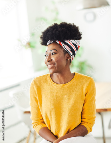 portrait young african american girl woman smiling office classroom casual lifestyle happy home student photo