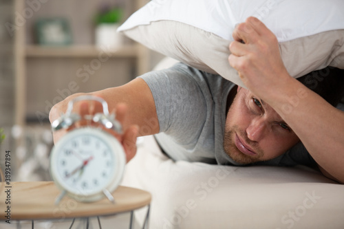 Photos man has bad morning migraine