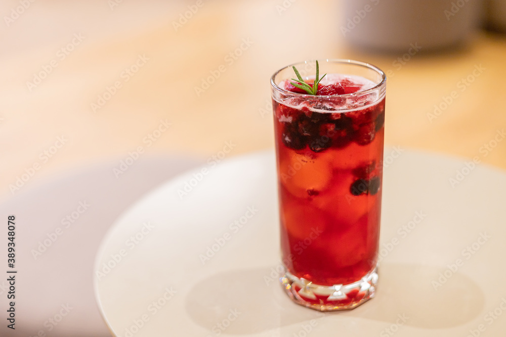 A glass of berryade, very sweet A glass of berryade, very sweet