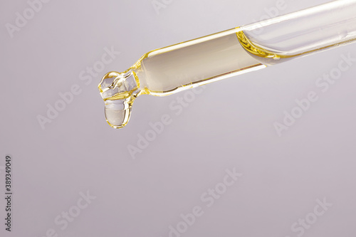 Pipette with essential oil The concept of beauty, skin care, aromatherapy, spa, cosmetology. Close-up, detailed macro photo...