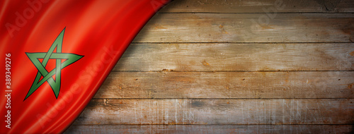 Foto Moroccan flag on vintage wood wall banner