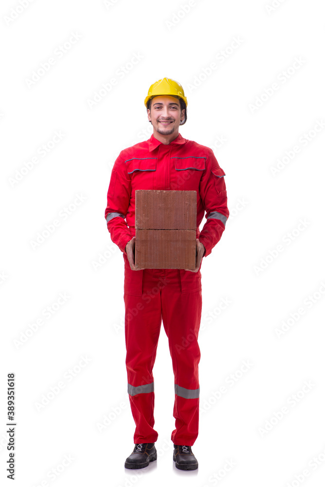 Young male mason with brick isolated on white Young male mason with brick isolated on white