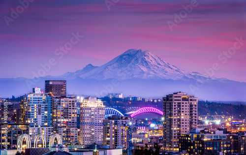 beautiful city scape with mountain and colorful sky at sunset