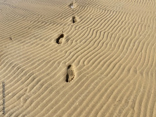 traces de pas sur le sable