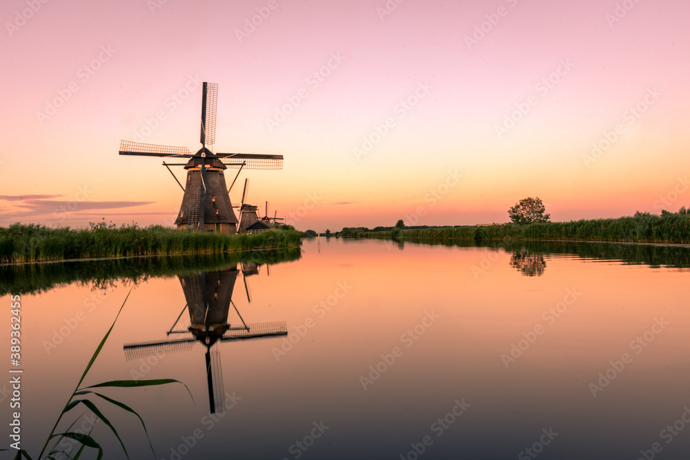 Amazing sunset over the windmills of Kinderdijk, Netherlands