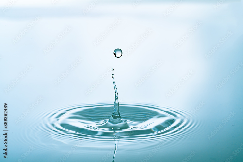 Water splash of falling drop with circular waves Water splash of falling drop with circular waves