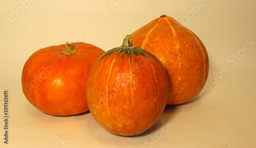 Three orange pumpkins on a white background for halloween