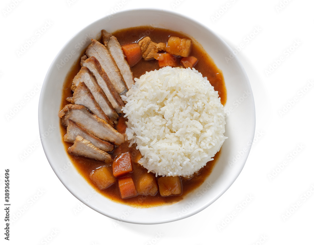 Roasted pork slices topped up Japanese curry with rice in Bird eyes view Roasted pork slices topped up Japanese curry with rice in Bird eyes view