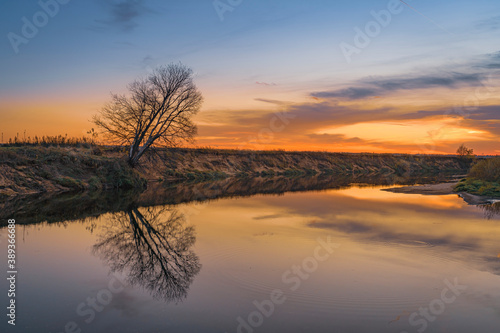 Autumn sunrise over the river in Moscow Region, Russia