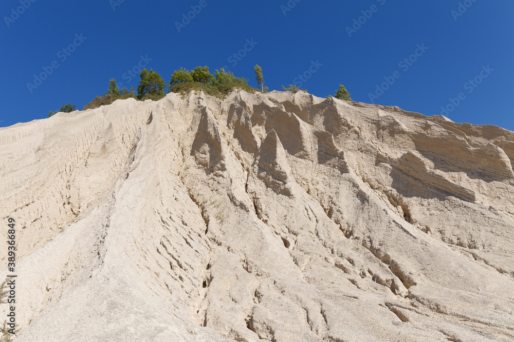 Sand slopes of abandoned quarry. Rummu, Estonia