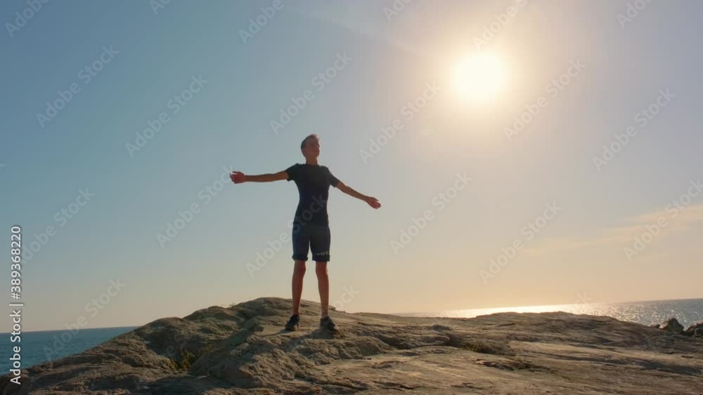 Man walks along the seashore at sunset, the concept of travel and relaxation. Man walks along the seashore at sunset, the concept of travel and relaxation.
