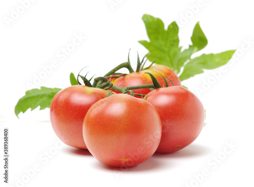 Fresh tomatoes on white background.