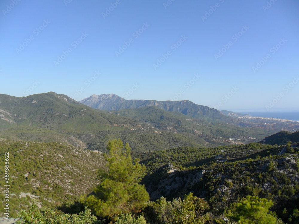 Obraz premium Paragliding and hiking in the Taurus mountains outside of Alanya in the Antalya region of Turkey