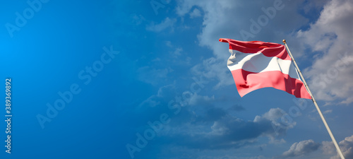 Beautiful national state flag of Austria with blank space. Austrian flag on wide background with place for text 3D artwork.