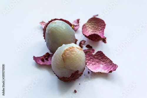 Ripe litchi on a white and isolated background.
