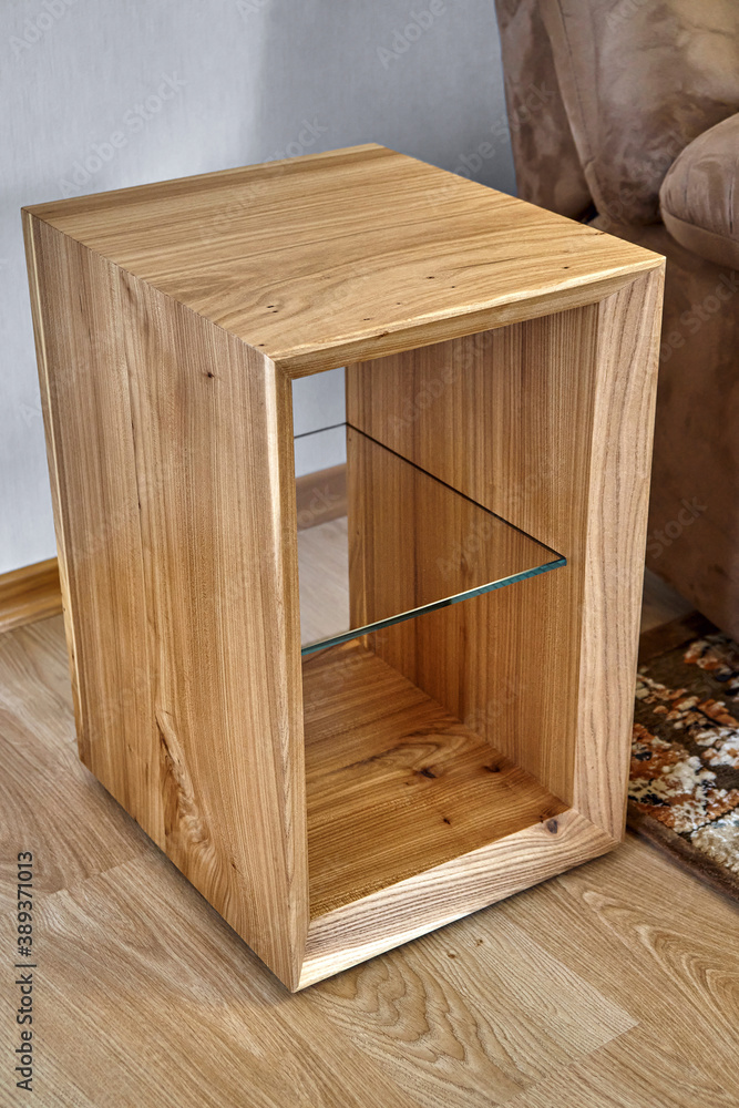 Live edge elm slab sofa side table in contemporary living room. Modern furniture Live edge elm slab sofa side table in contemporary living room. Modern furniture