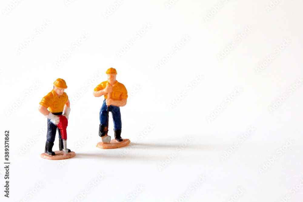 small figures worker  with under construction concept