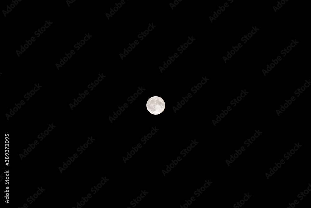 Full blue moon with black sky background Full blue moon with black sky background