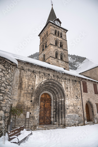 Bell tower in the snowy Arties, in the Spanish Pyrenees, Catalonia, Spain © Elias PRV