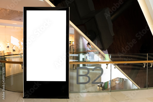 Billboard mock up inside department store. Template of an interior empty information billboard, Mock-up of a shopping mall banner placeholder and poster.