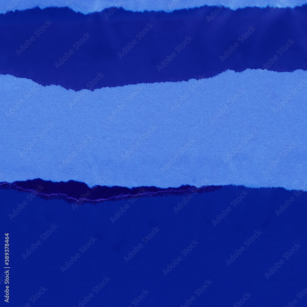 Blue and violet torn paper collage close-up. Texture made from various paper and cardboard parts. Damaged old paper background. Vintage blank wallpaper. Material design backdrop. Blue and violet torn paper collage close-up. Texture made from various paper and cardboard parts. Damaged old paper background. Vintage blank wallpaper. Material design backdrop.